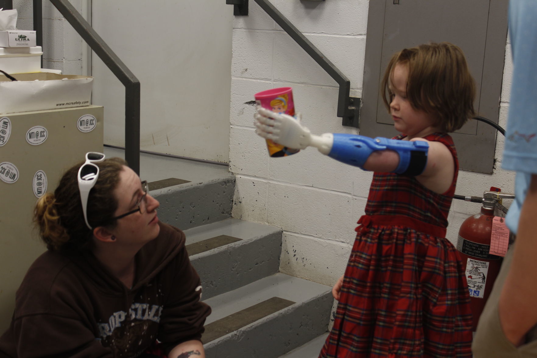 Wellsville kindergartener tries out new prosthetic hand